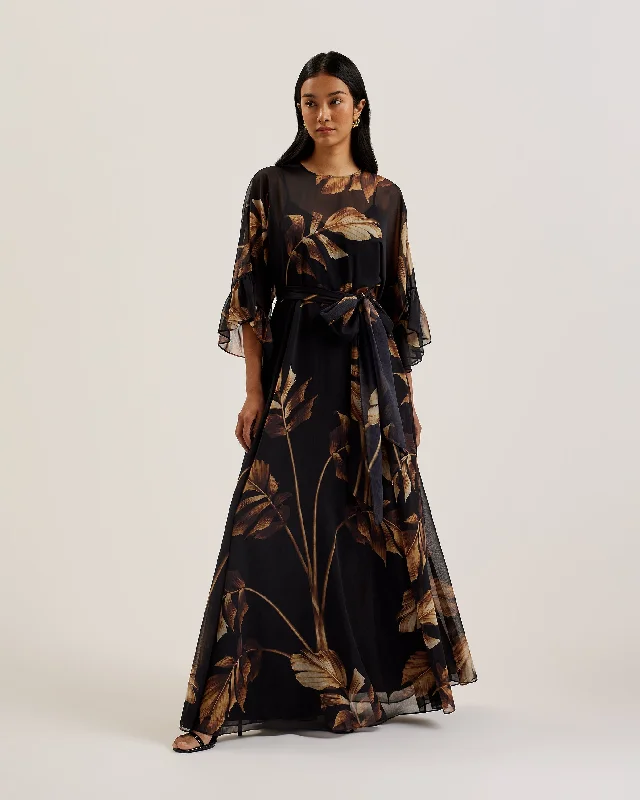 Off-shoulder dresses for evening wear -Calama Sheer Printed Maxi Dress With Slit Black