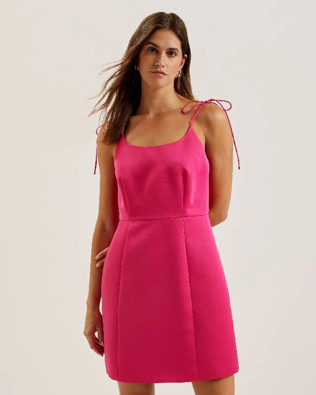 Dresses with tiered skirts -Kavala Tie Strap Bodice Waist Mini Dress Fuchsia